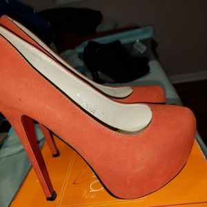 Orange pumps